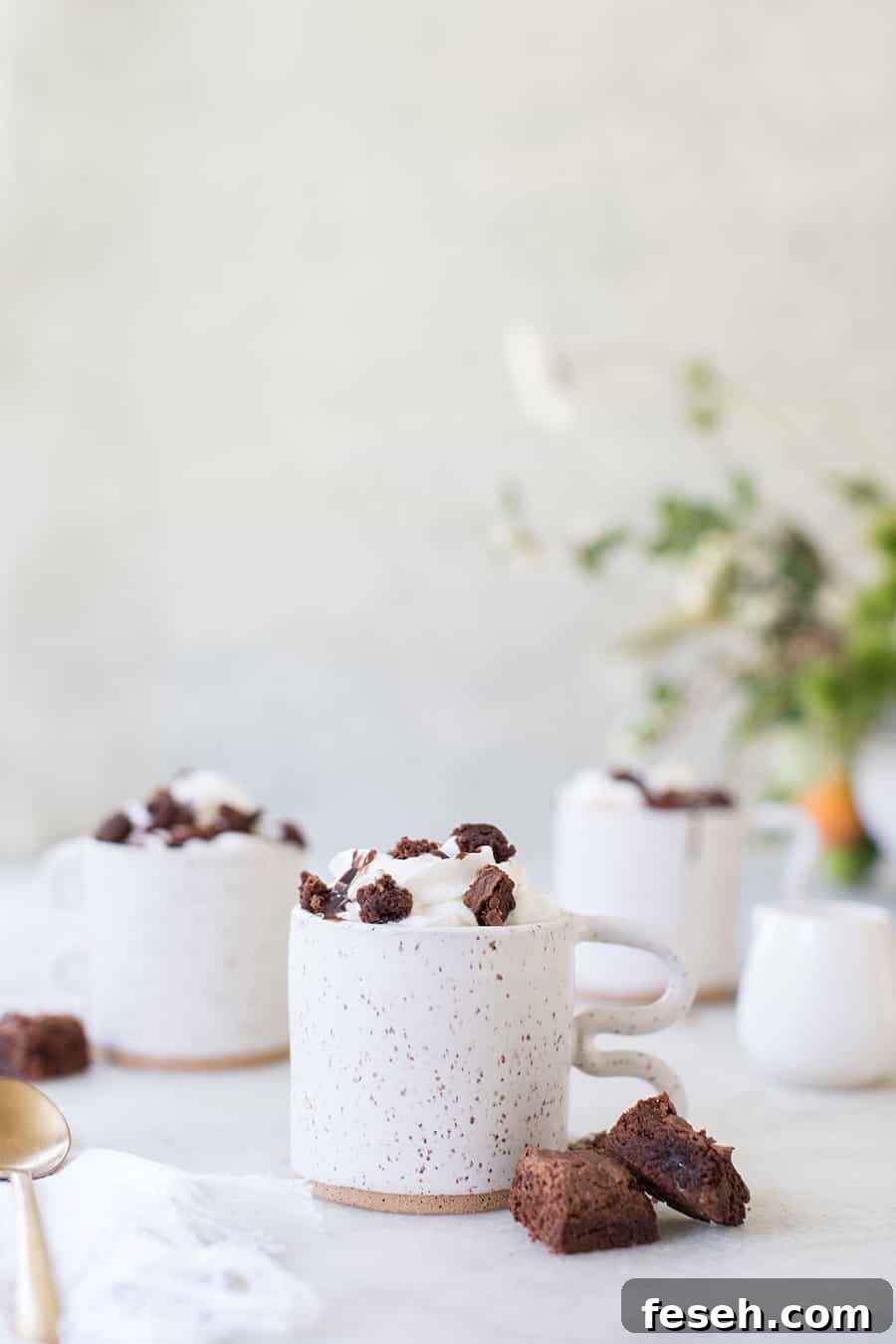 side shot of caramel coffee in a cup