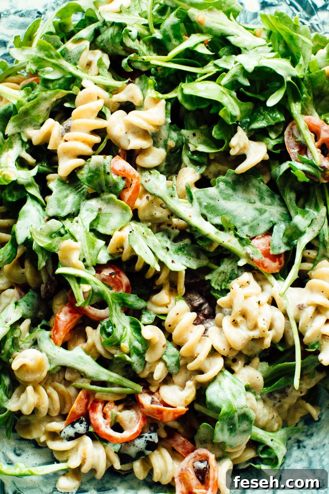 Creamy Arugula, Goat Cheese, and Tomato Pasta Salad
