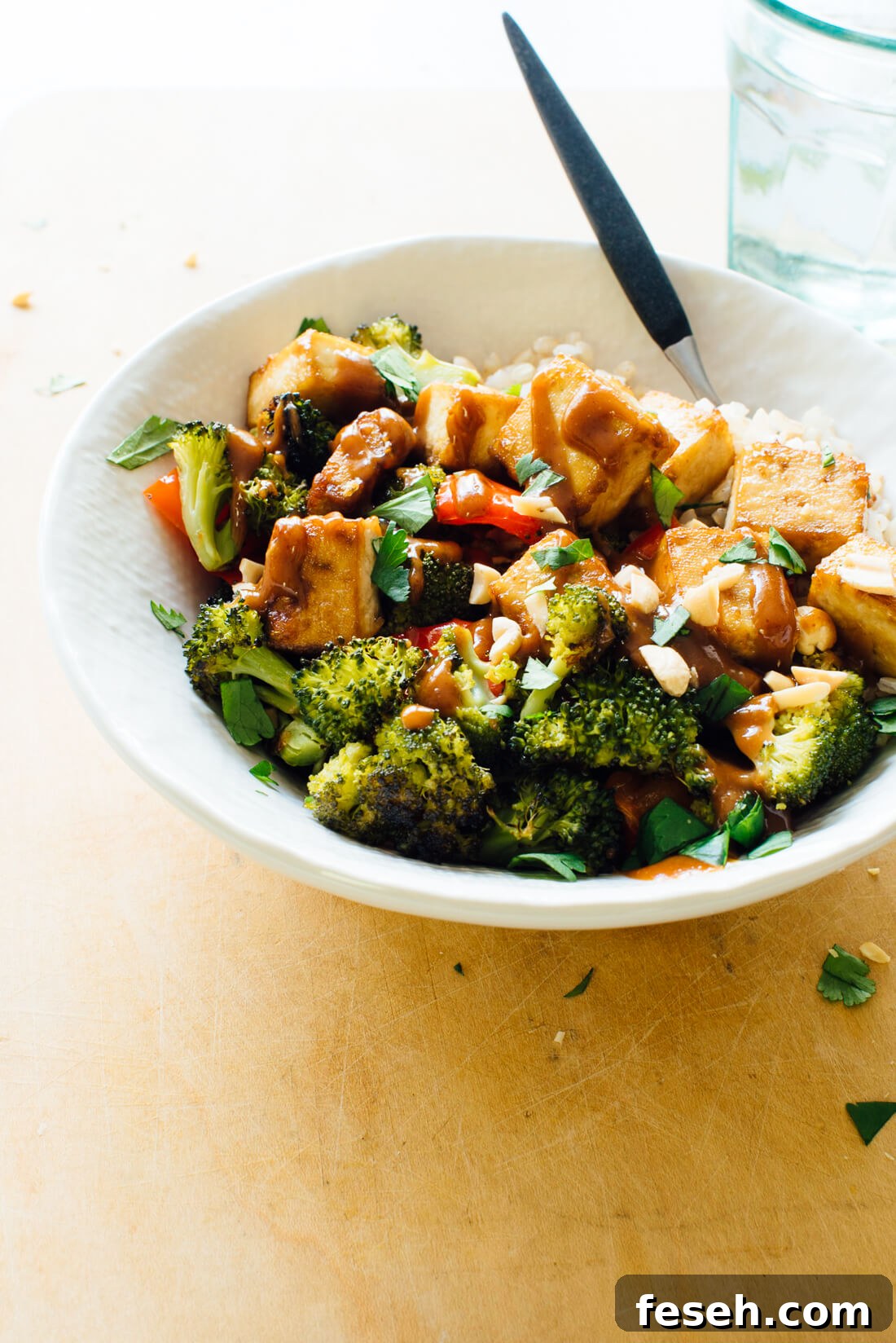 Roasted Broccoli, Bell Pepper, and Tofu Bowl with Peanut Sauce