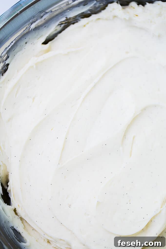 The BEST Cream Cheese Frosting recipe ever! So rich and creamy, perfect for carrot cake, banana cake and whoopie pies!