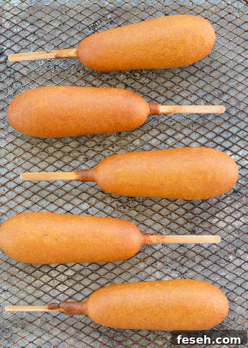 Learn how to make the best Air Fryer Corn Dogs! Corn dogs in the Air Fryer are irresistibly hot and crunchy and are ready in minutes!