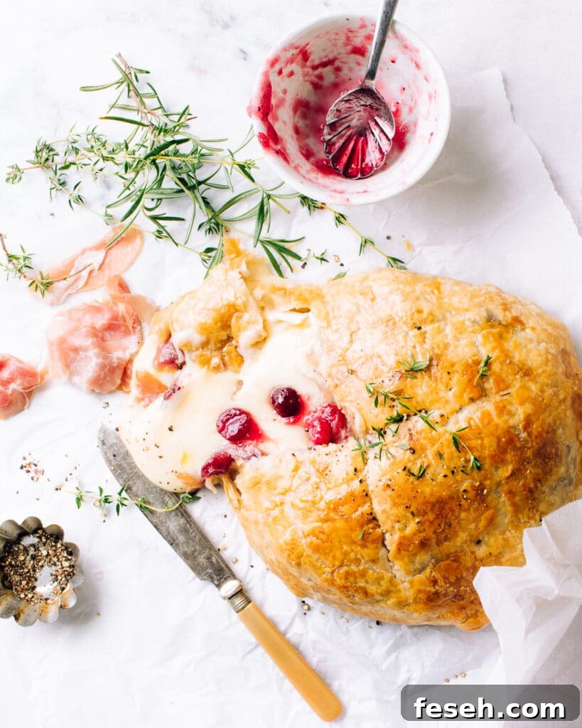 Puff Pastry Baked Brie with cranberries.