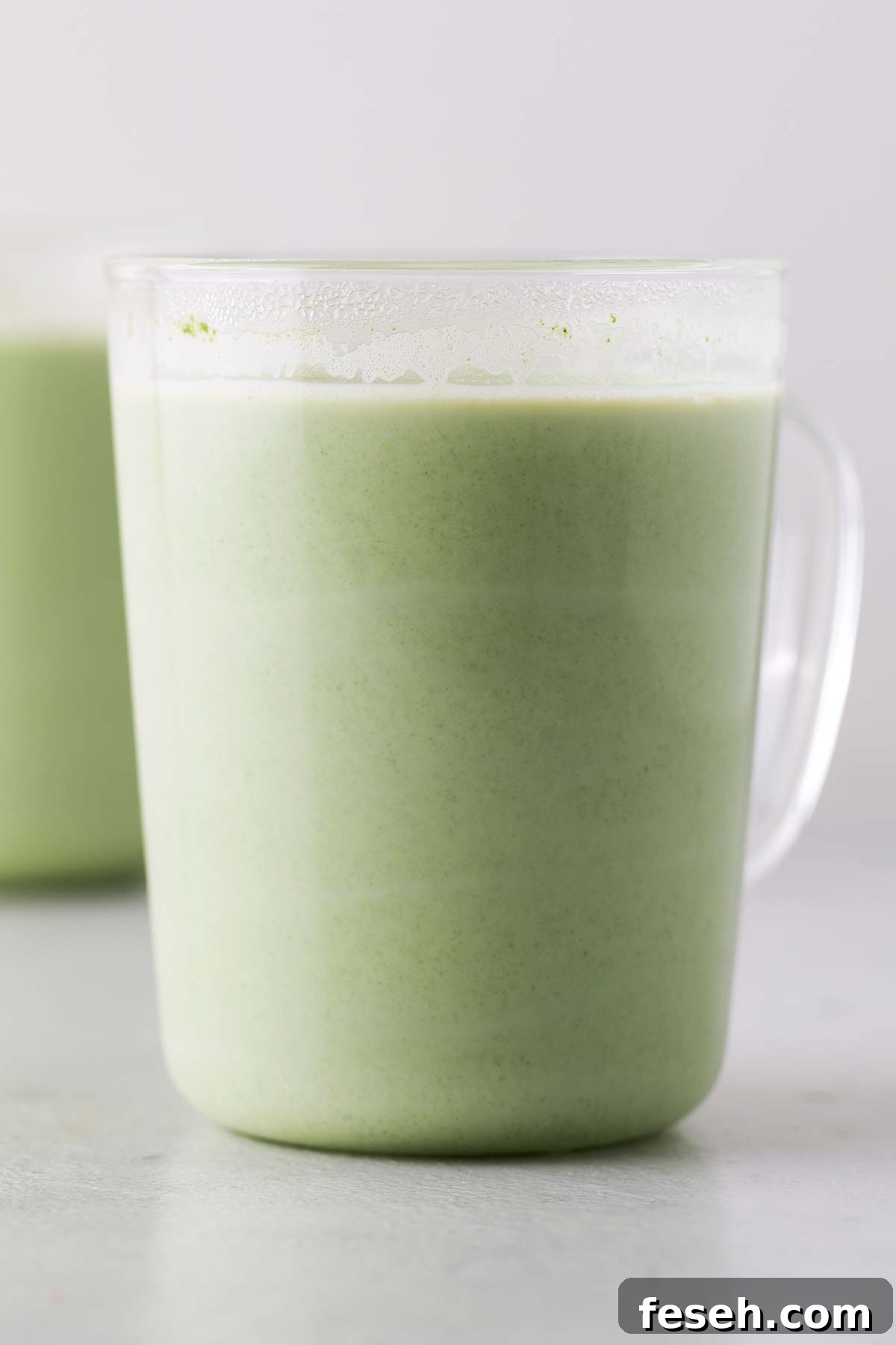 Dunkin' Matcha Latte Copycat in a clear mug.