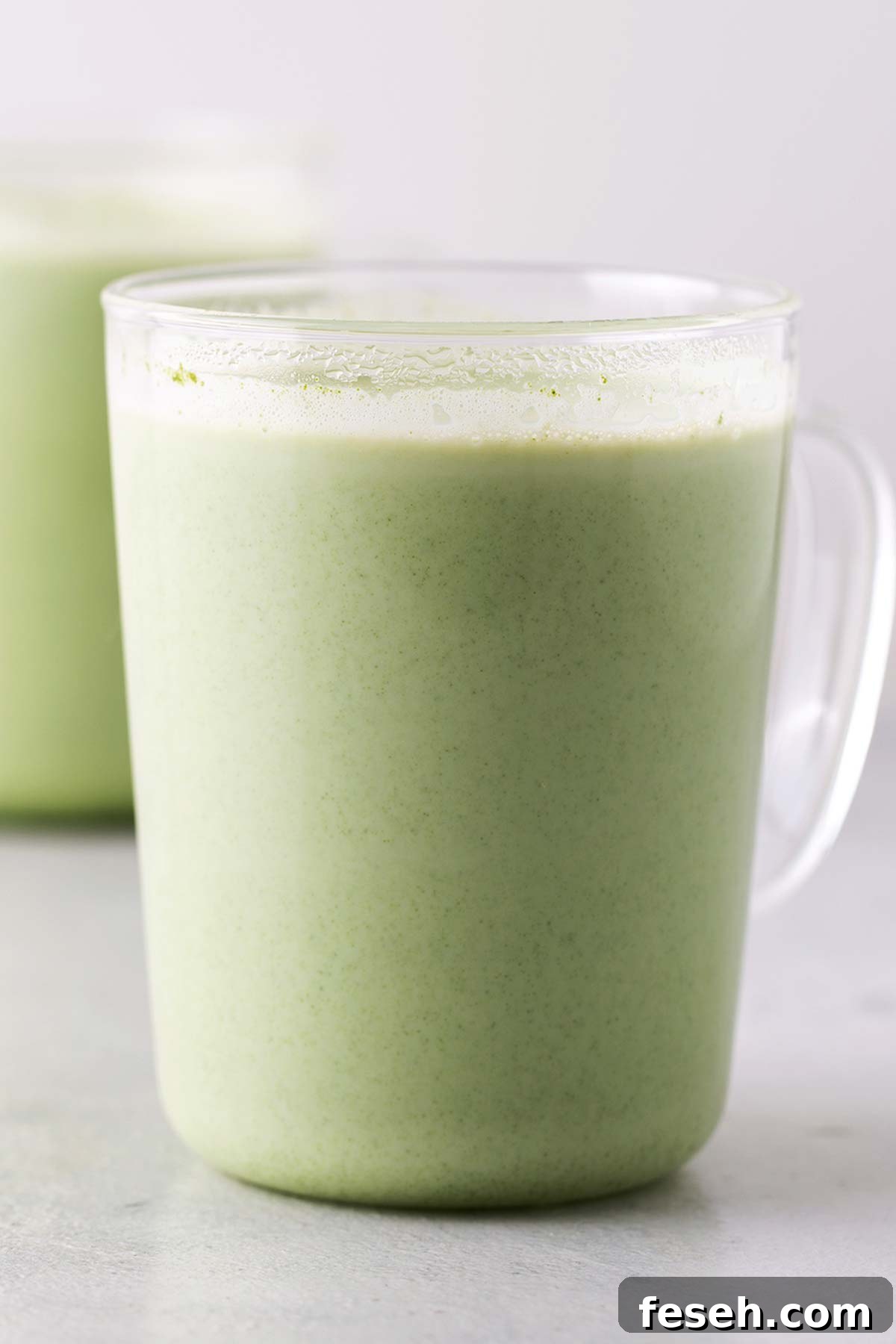 Dunkin' Matcha Latte Copycat in a clear mug.