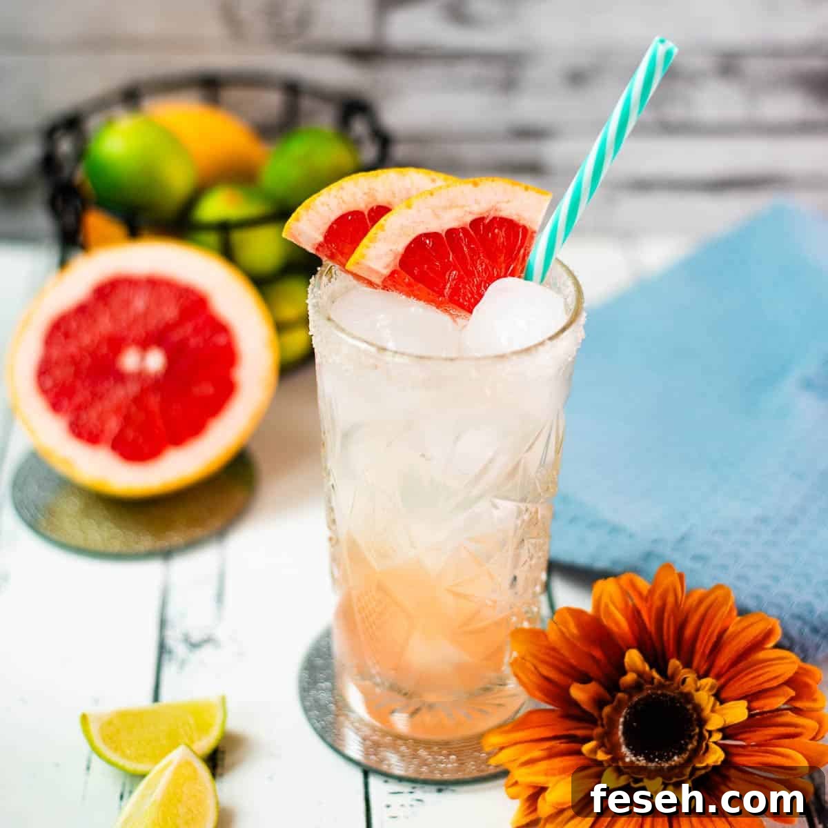 Colorful and refreshing paloma cocktail in a highball glass