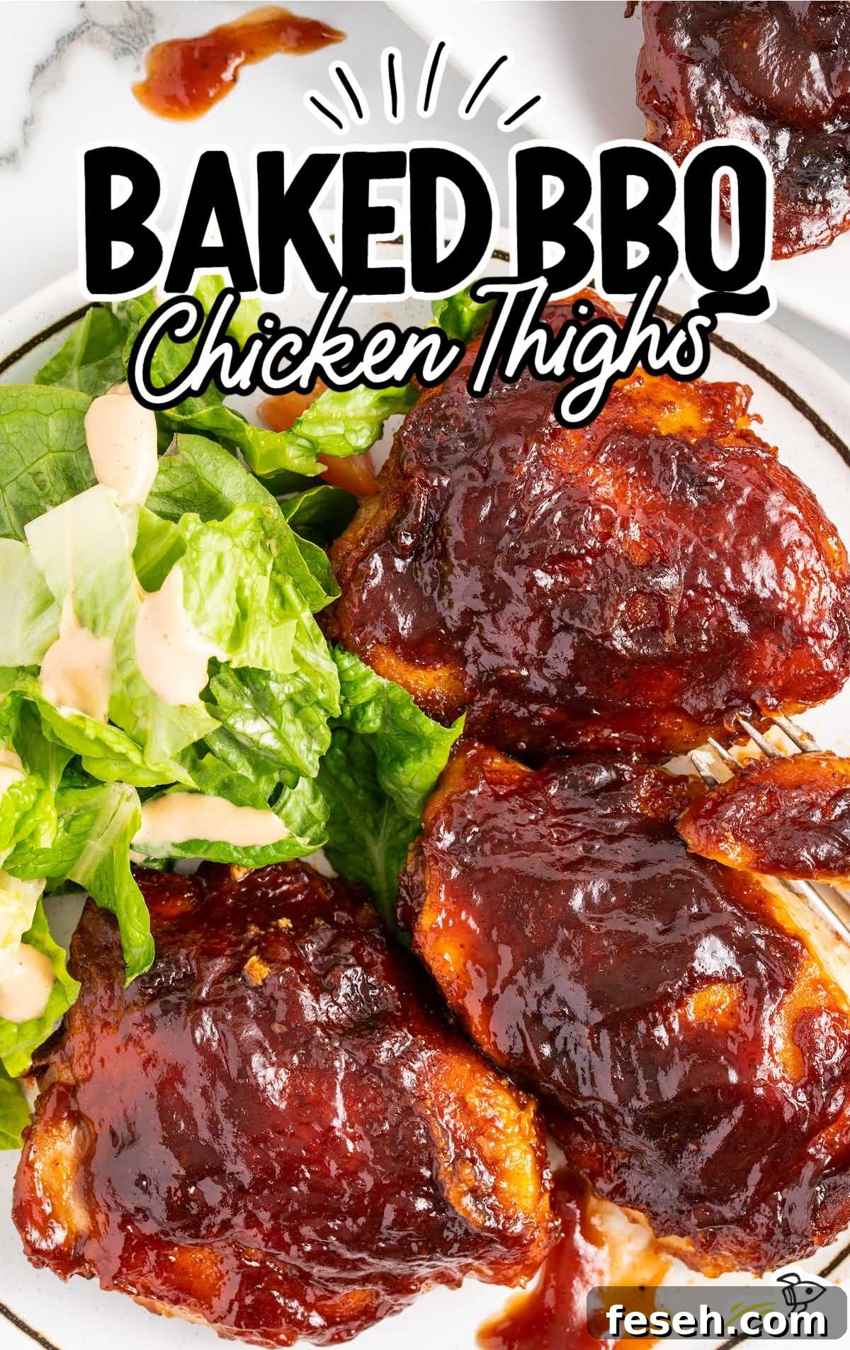 overhead shot of a plate of bbq chicken thighs served with a salad
