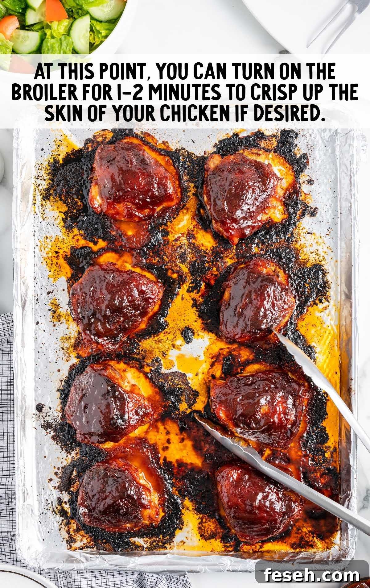 bbq chicken thighs baked on a baking dish