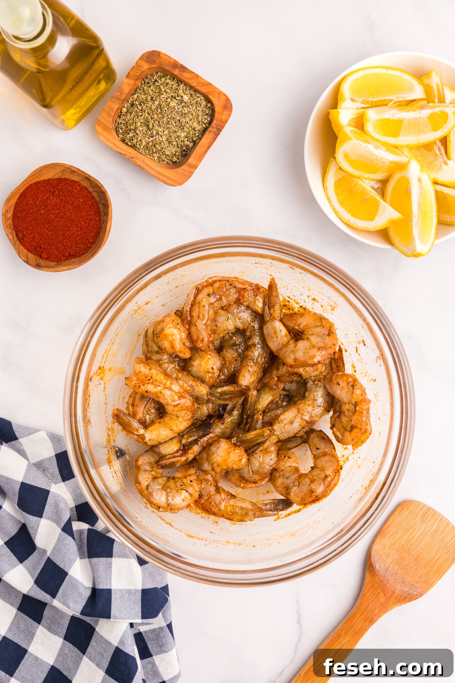 Shrimp fully coated in the marinade, evenly seasoned and ready for grilling.