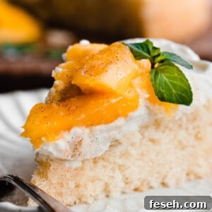 Mango cake on a dessert plate.