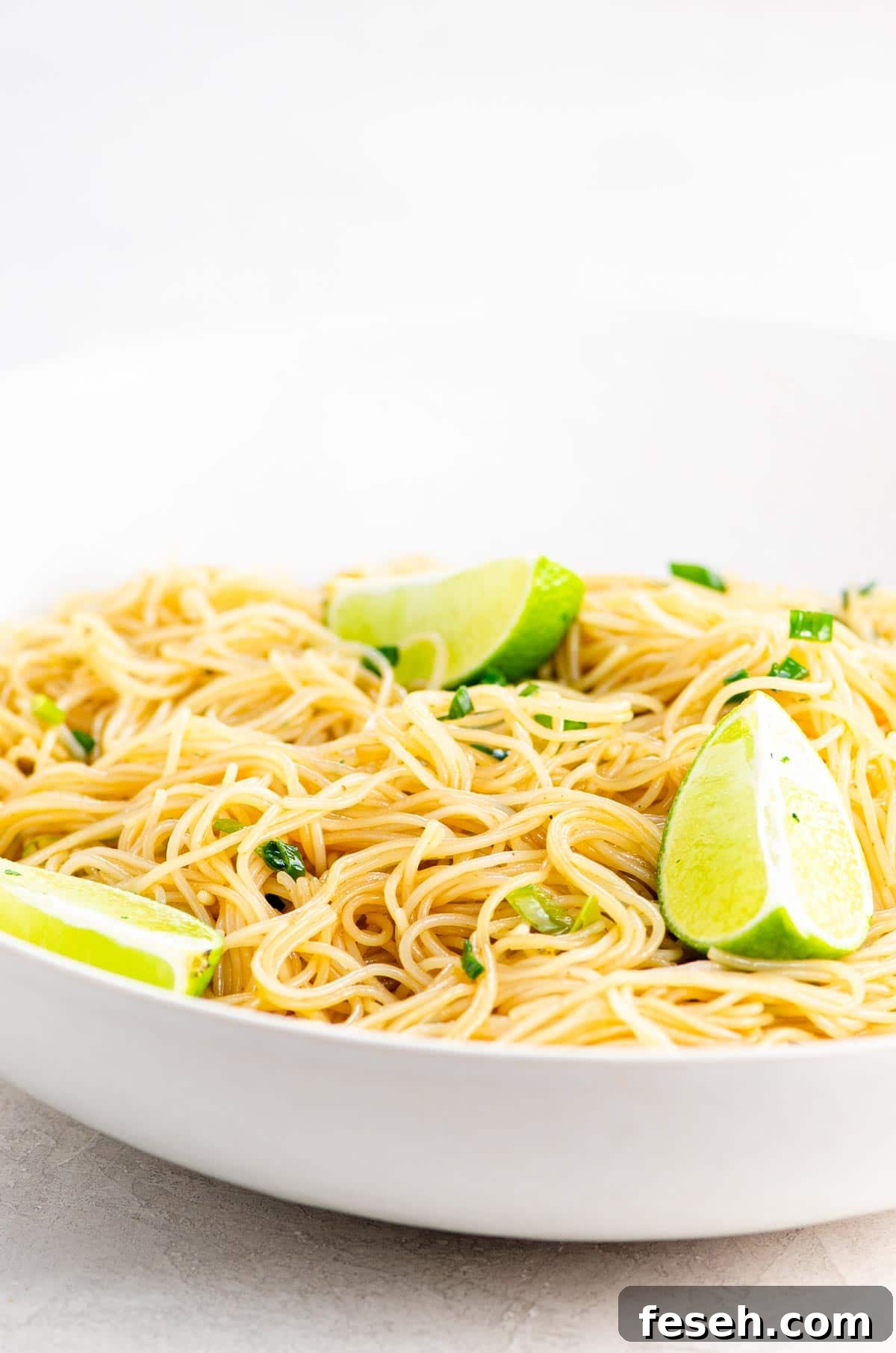 Vegan rice noodles in a white bowl