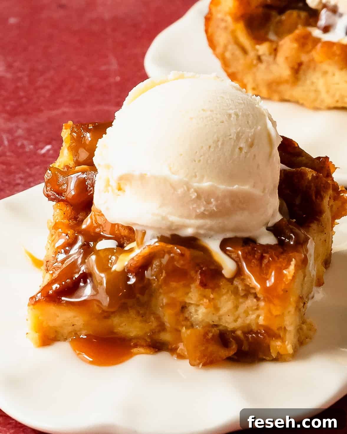 Apple bread pudding is a decadent breakfast or dessert dish made with day old bread and spiced apples soaked in a creamy apple cider custard. Once baked this bread and apple pudding can be topped with salted caramel sauce, creamy vanilla sauce or powdered sugar. 