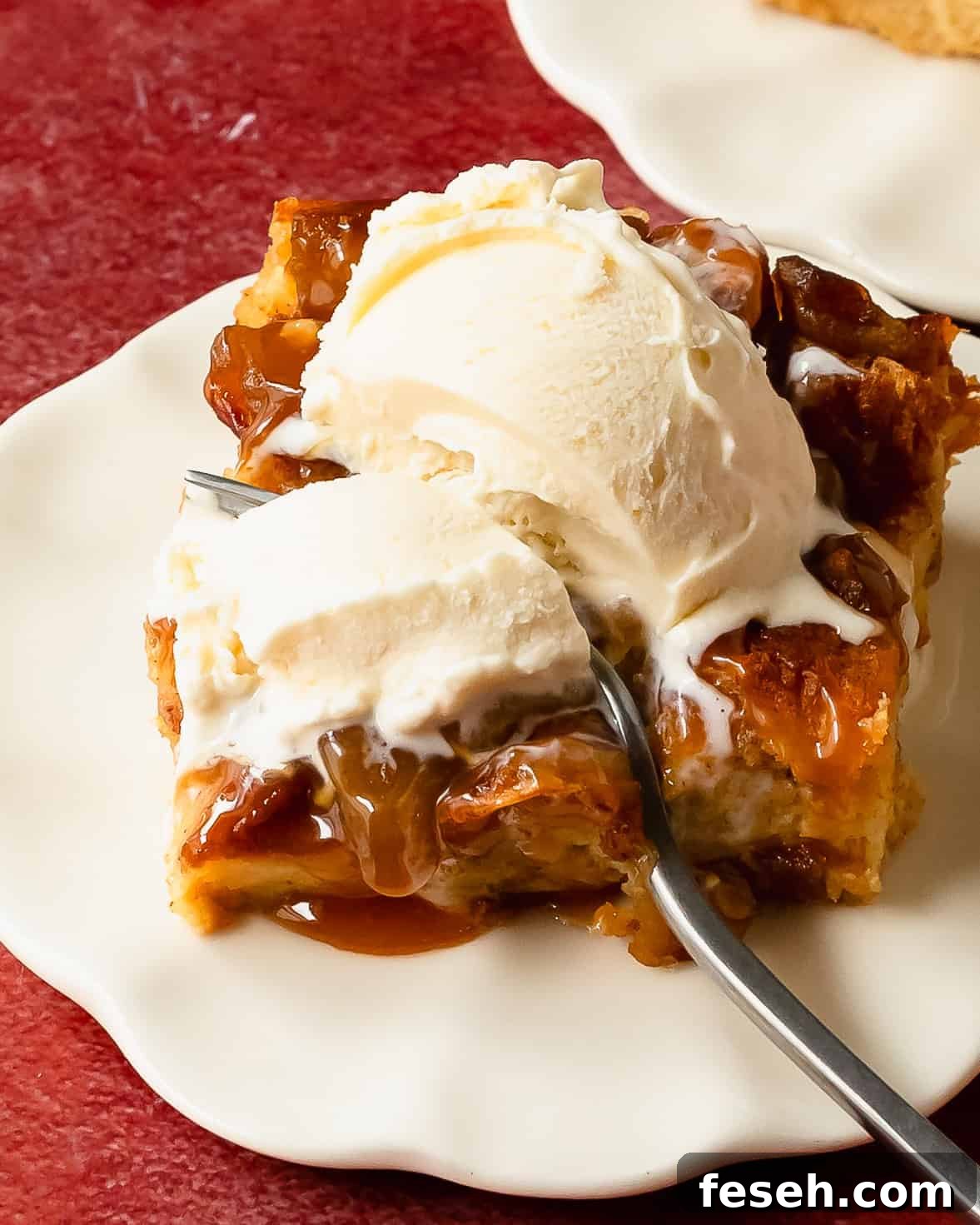 Apple bread pudding is a decadent breakfast or dessert dish made with day old bread and spiced apples soaked in a creamy apple cider custard. Once baked this bread and apple pudding can be topped with salted caramel sauce, creamy vanilla sauce or powdered sugar.