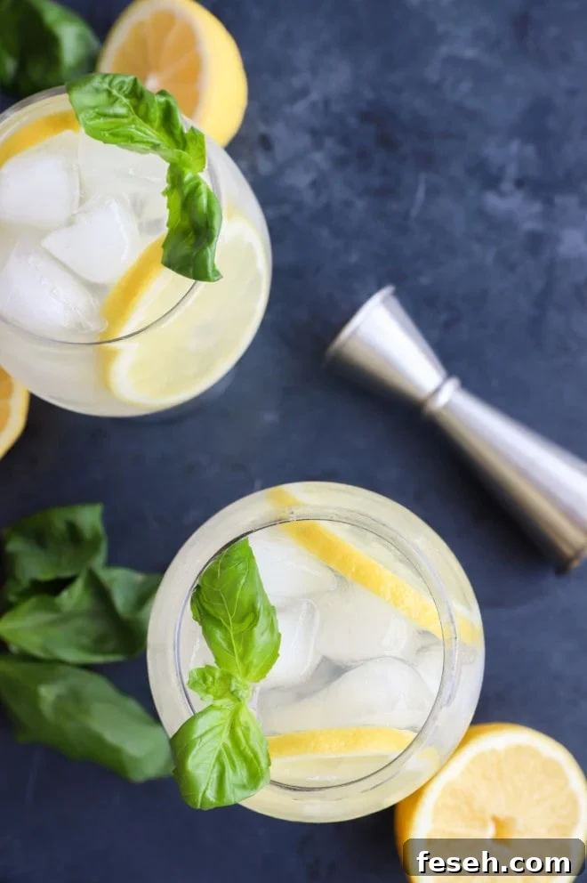 Overhead image of lemon basil cooler cocktails in glasses