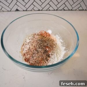 Flour with seasoning in a bowl.