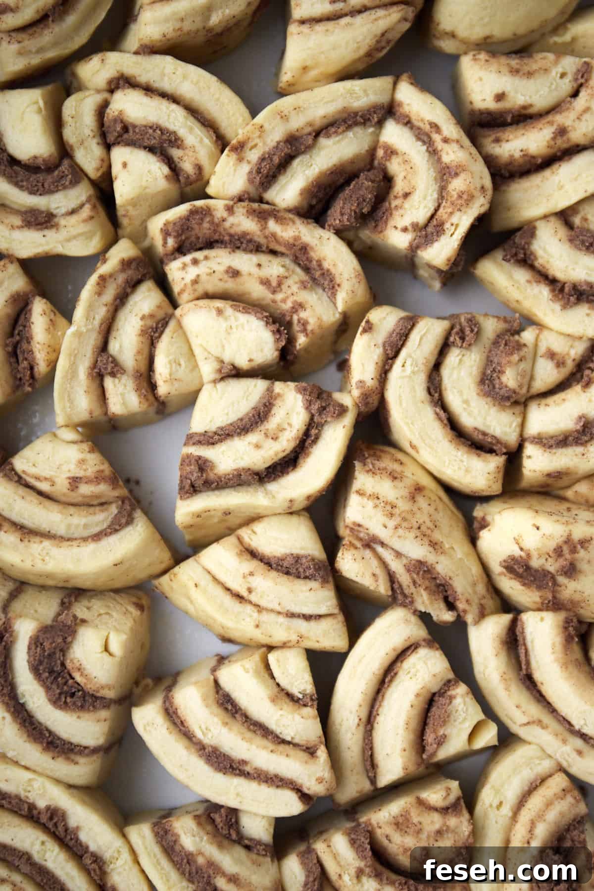 quartered cinnamon roll dough