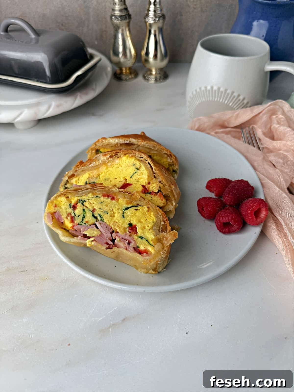 Slices of the breakfast egg bake ready to eat.