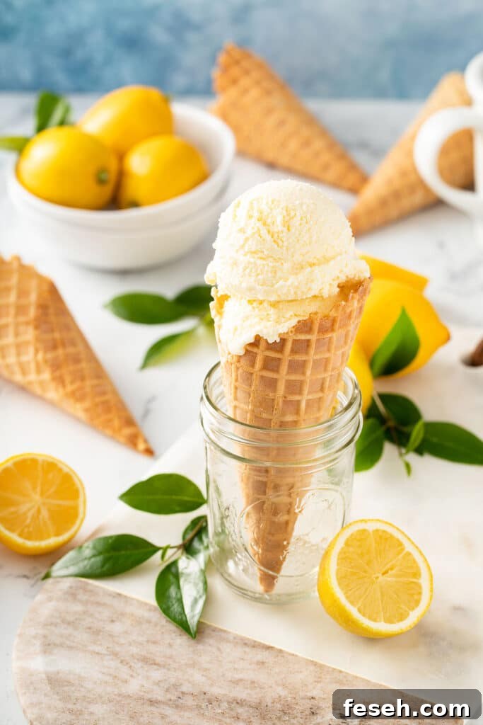 Ice cream cone with a scoop of creamy ice cream