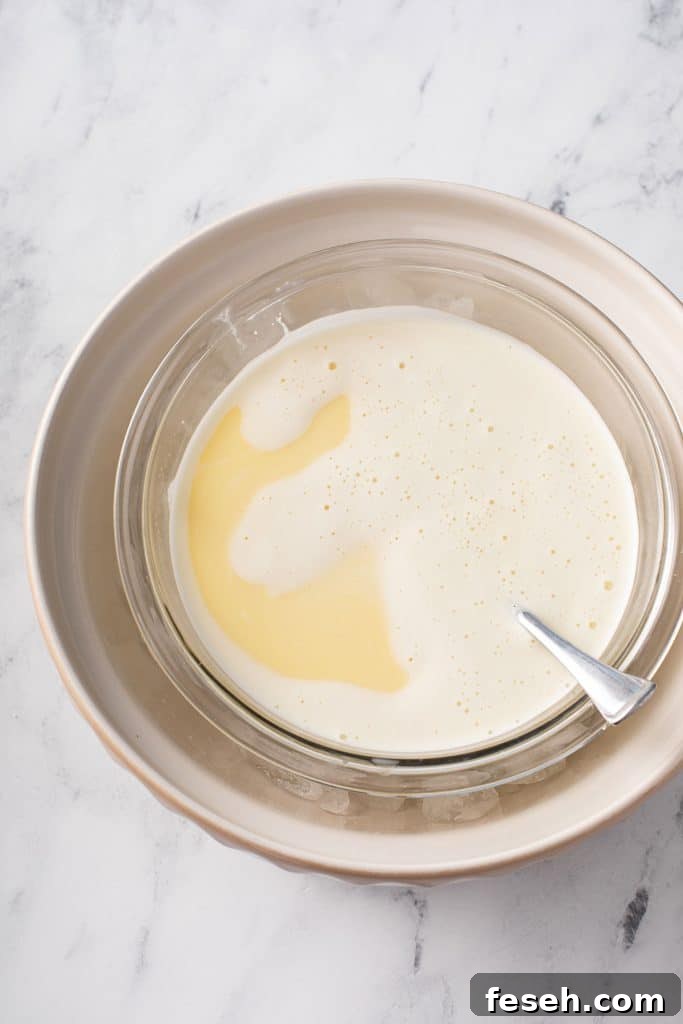 Tempering custard in a glass bowl
