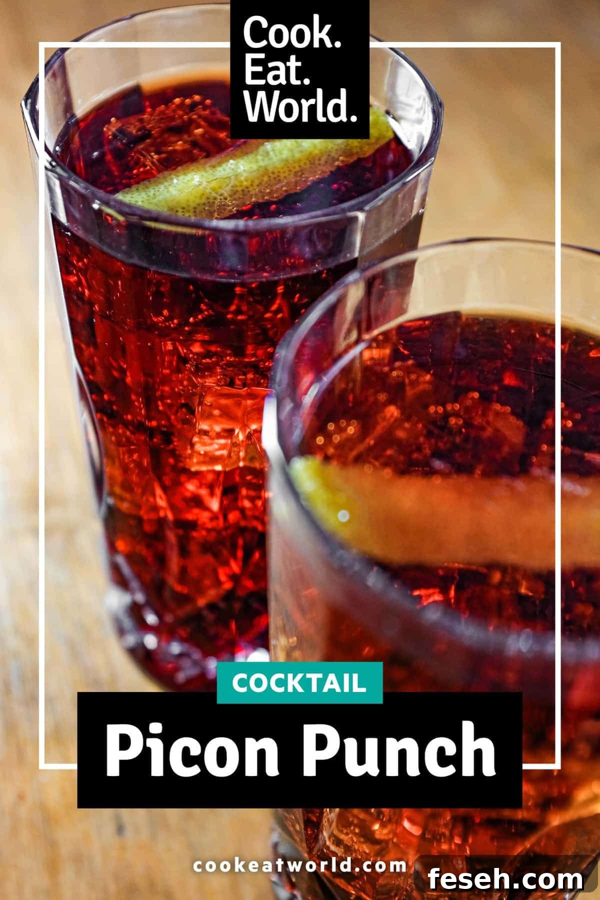 Two cut glass highball glasses of a cocktail called Picon Punch
