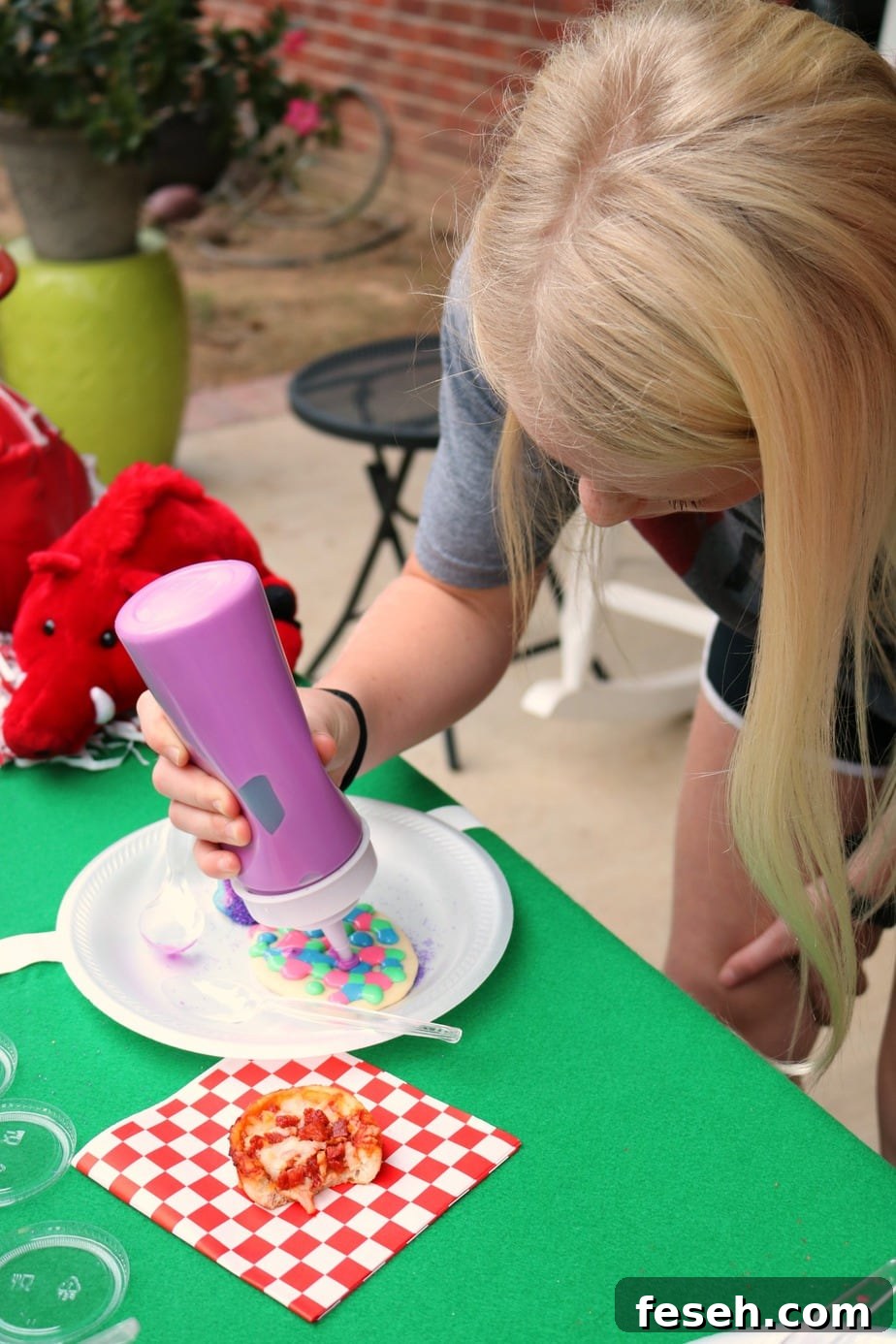 Pizza and Cookie Decorating are the perfect winning combo for game day with kids.