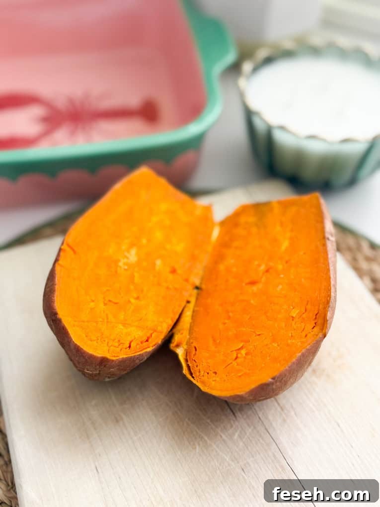 Cooked sweet potato cut in half.