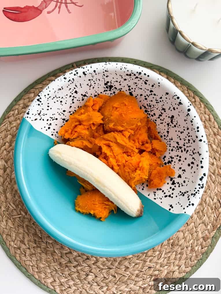 Cooked sweet potato and banana in a bowl.