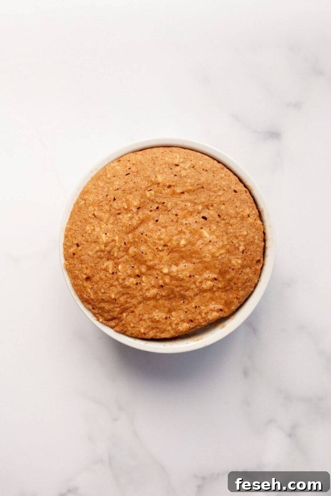 fluffy baked oats in ramekin after cooking in microwave