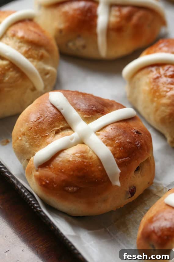 Hot Cross Buns are drizzled with sweet icing in the shape of a cross