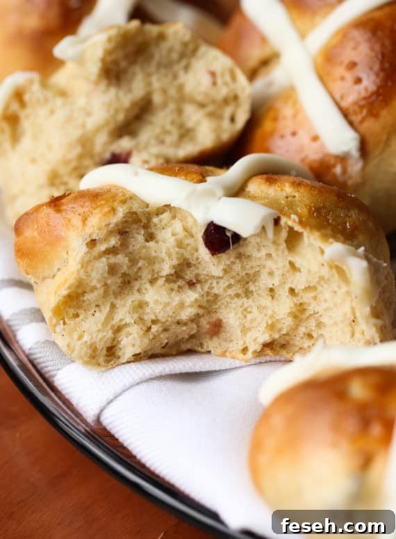 Hot Cross Bun cut in half