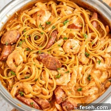 A pan filled with Shrimp Sausage Pasta.