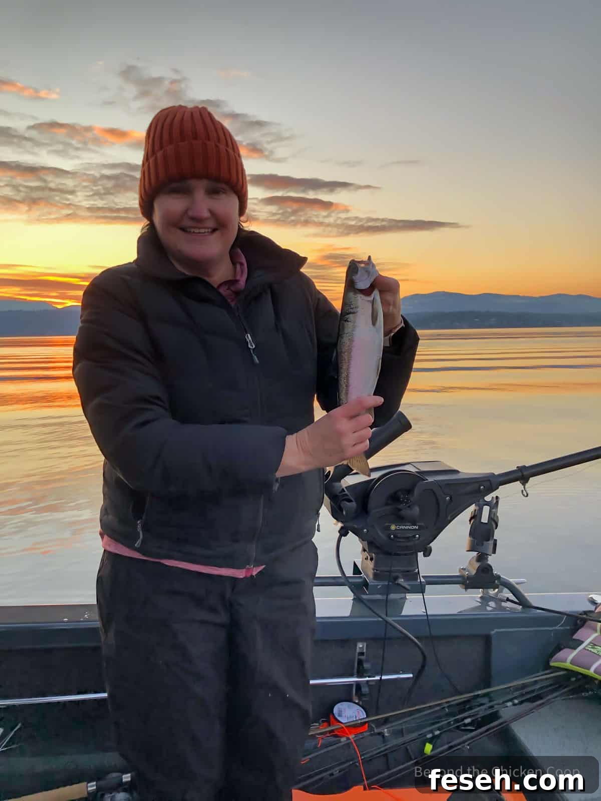 Holding a freshly caught fish.