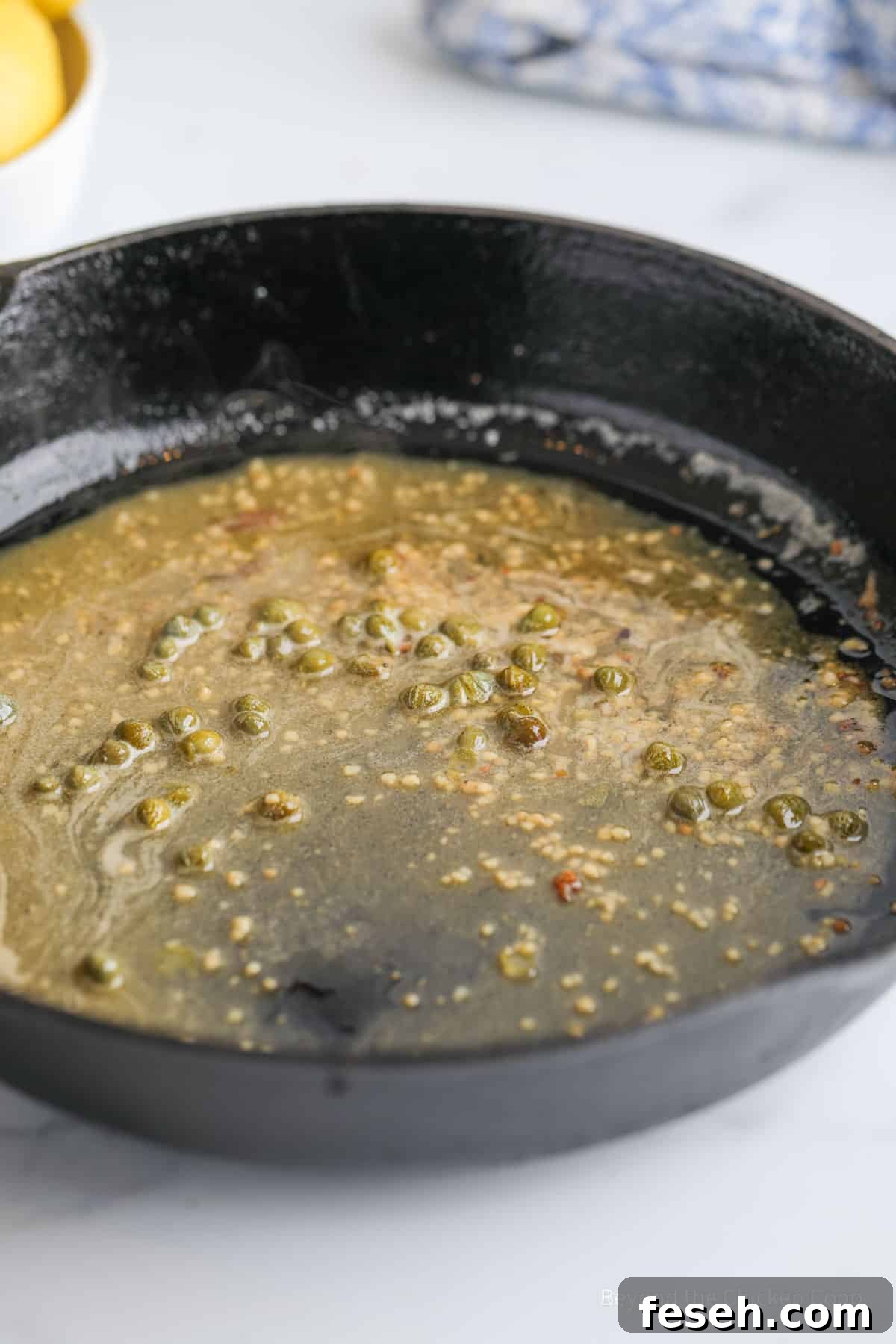Lemon butter in a cast iron pan.