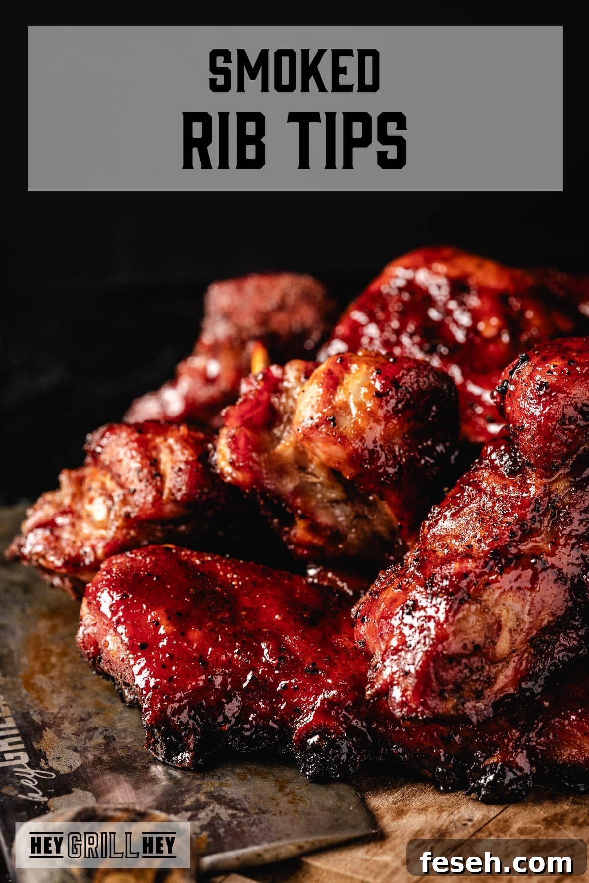 Sauced rib tips on wooden serving platter. Text reads 