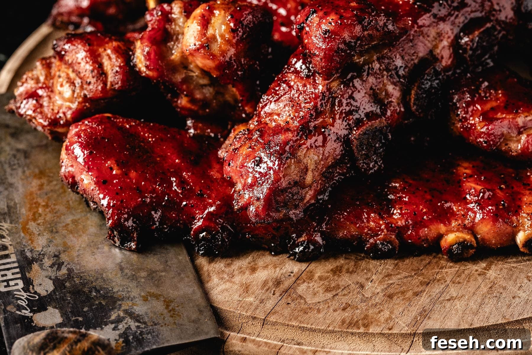 Smoked rib tips on wooden serving platter.