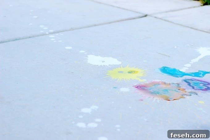 A science experiment, crowd pleaser, and boredom buster all in one! These sidewalk paint rockets splatter colorful bursts of chalk paint on the ground and clean up with water!