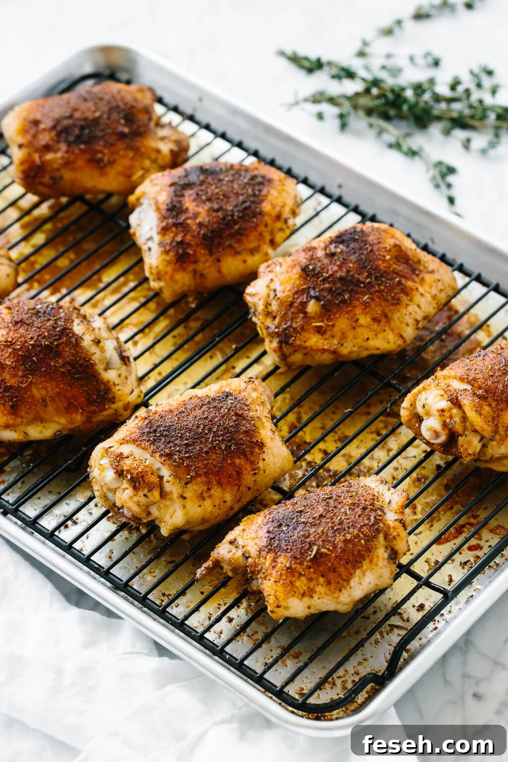 Baked chicken thighs are crispy, juicy, healthy and make for the perfect weeknight recipe!