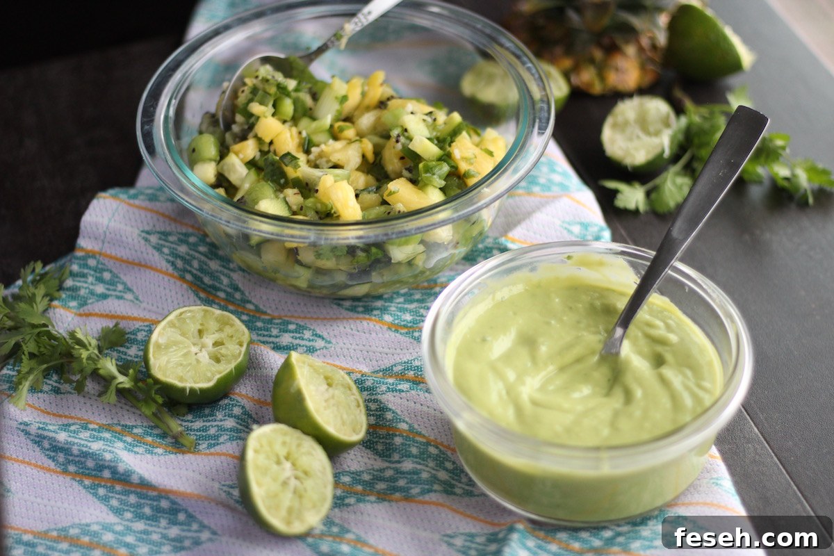 Loaded Tropical Plantain Nachos (AIP, Paleo) - these plantain nachos are piled high with grassfed beef, bacon, pineapple kiwi salsa, and avocado sauce! | fedandfulfilled.com
