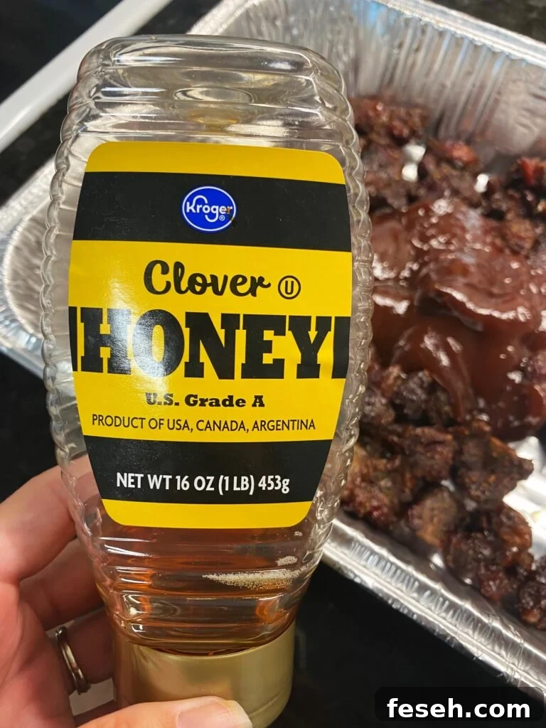 adding honey to steak