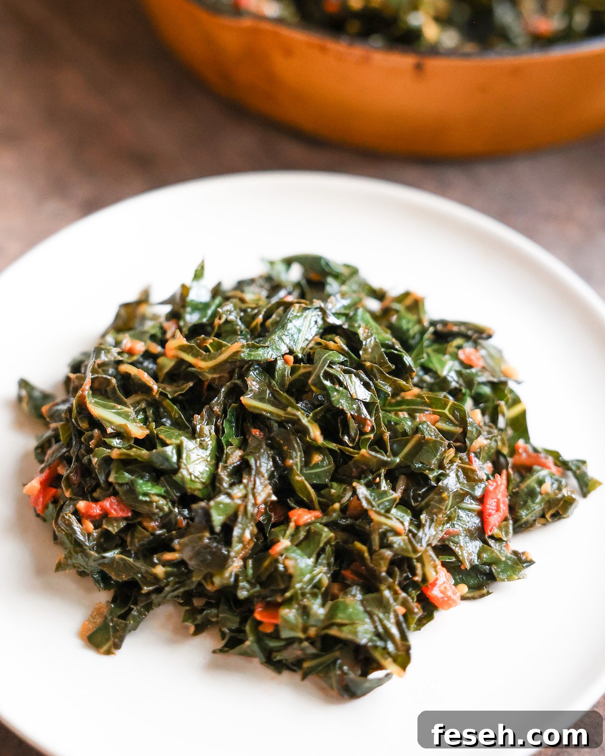 Vegan collard greens served on a plate.