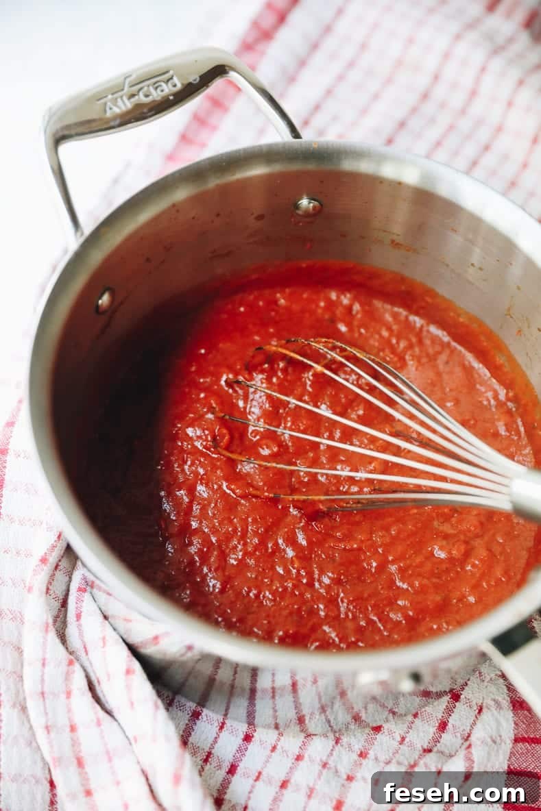 homemade enchilada sauce in a saucepan.
