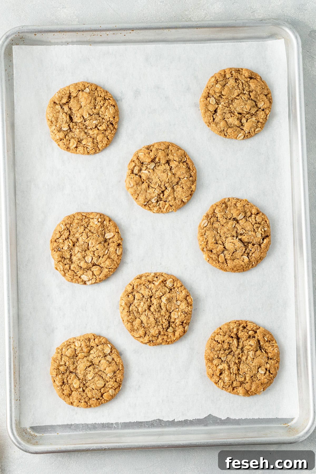 The cooked biscuits on a baking tray.