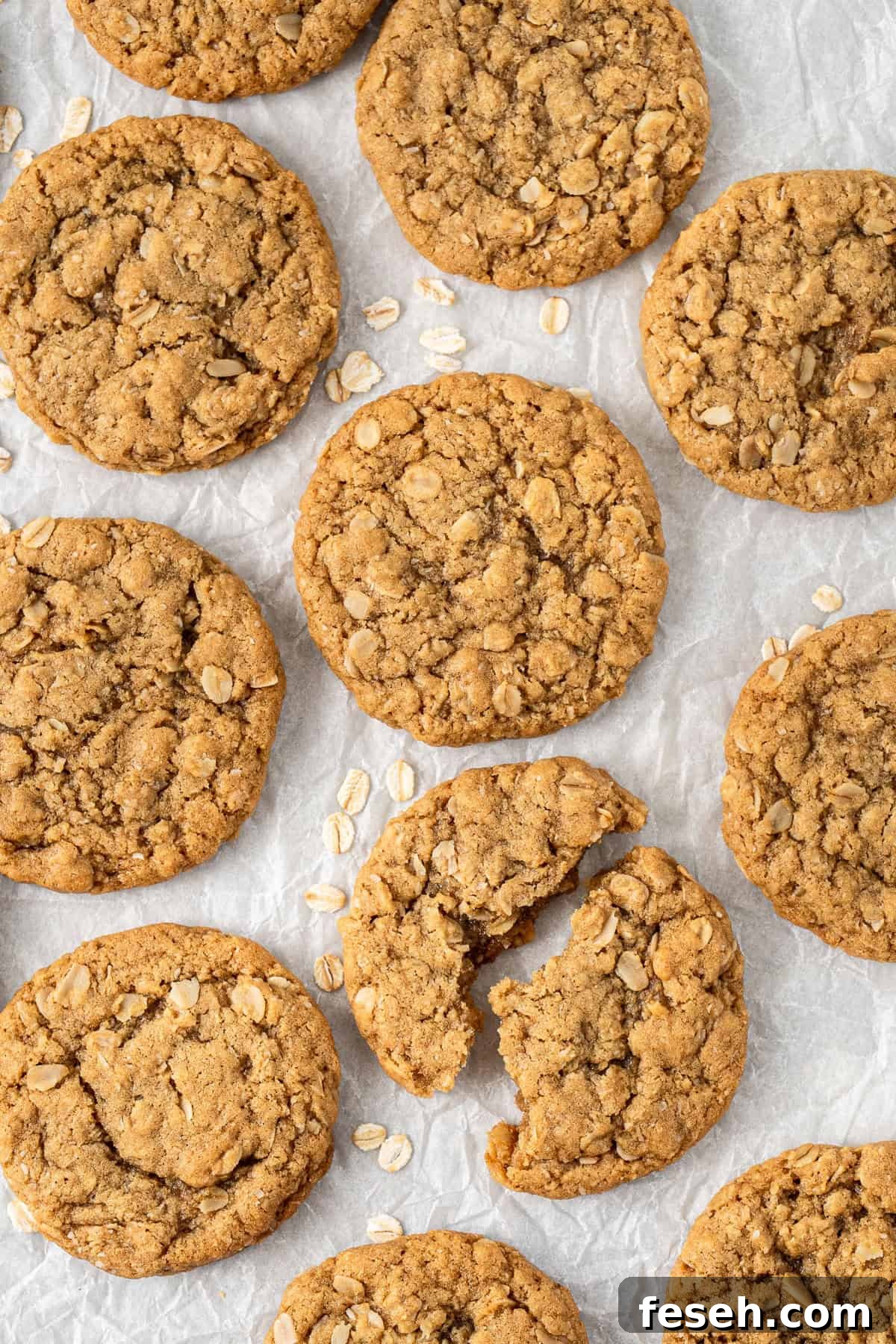 The cooked ANZAC biscuits, one broken in half.