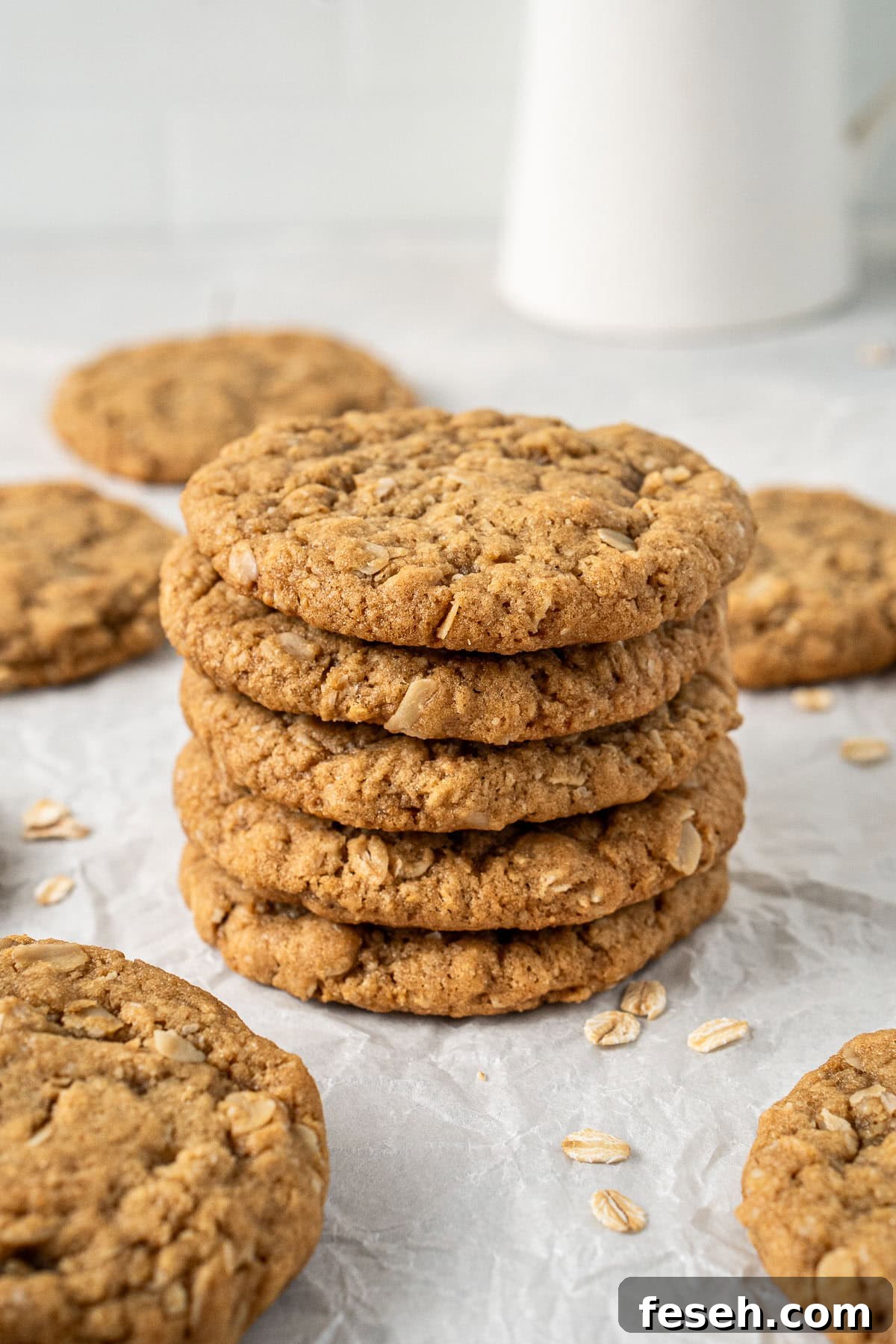 A stack of five dairy free ANZAC biscuits.