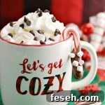 These chocolate dipped candy canes with marshmallows are perfect for kids to make as homemade gifts. Pair them with mugs and cocoa for a tasty gift basket or present them on their own. Such a simple but fun holiday food gift.