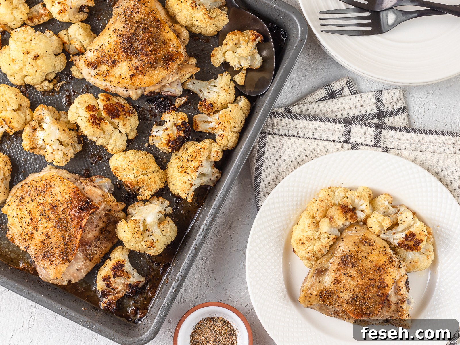 Baked Cajun Chicken Thighs served on a plate.