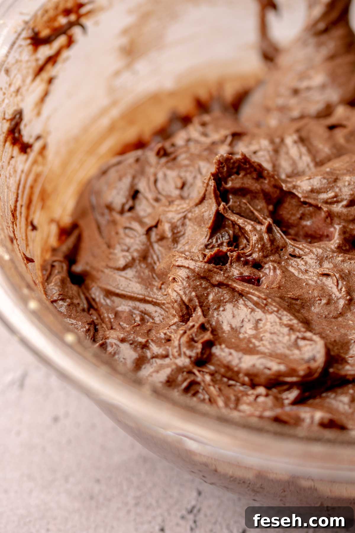 Finished brownie batter in a bowl.