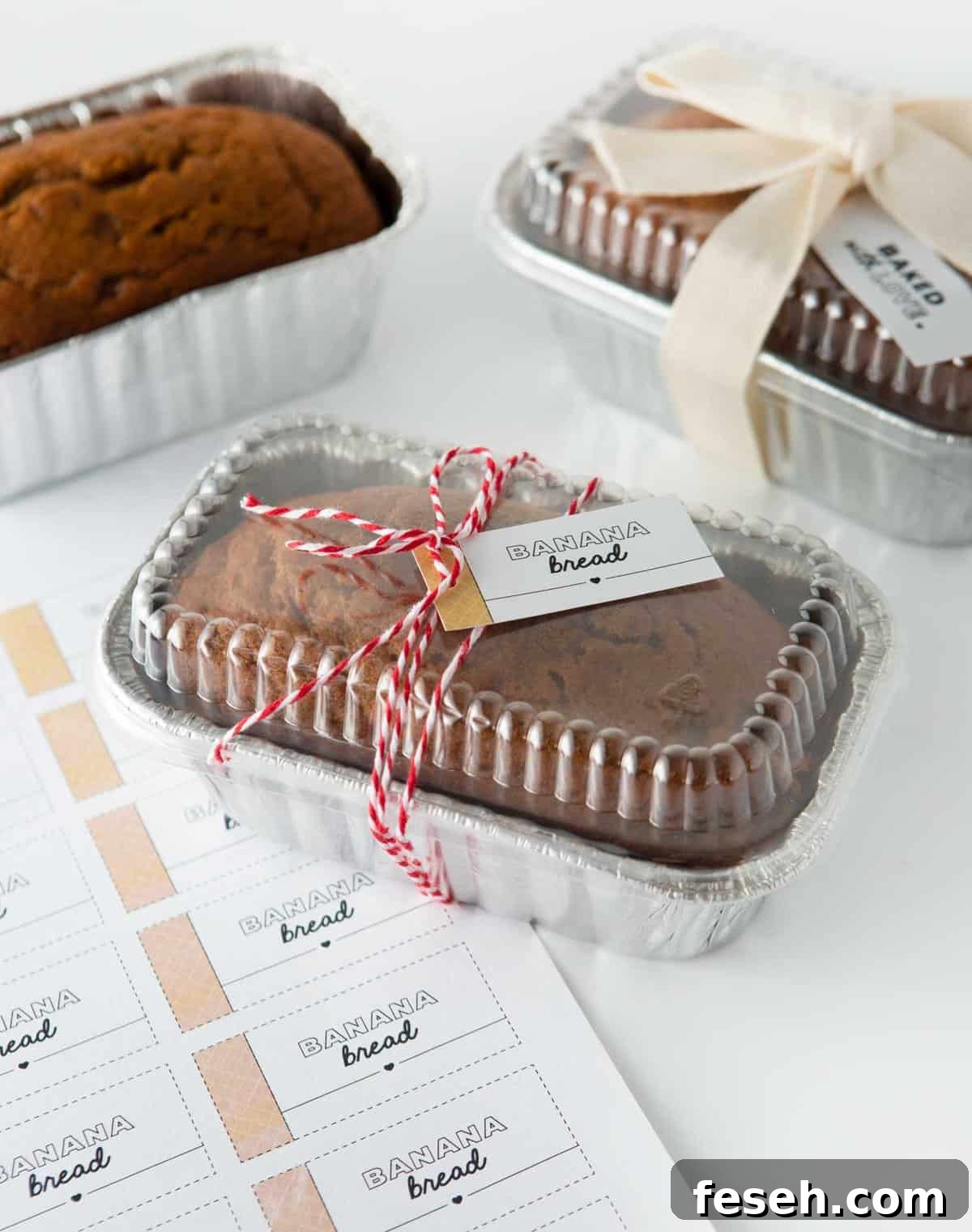 mini foil loaf pan of banana bread with gift tag