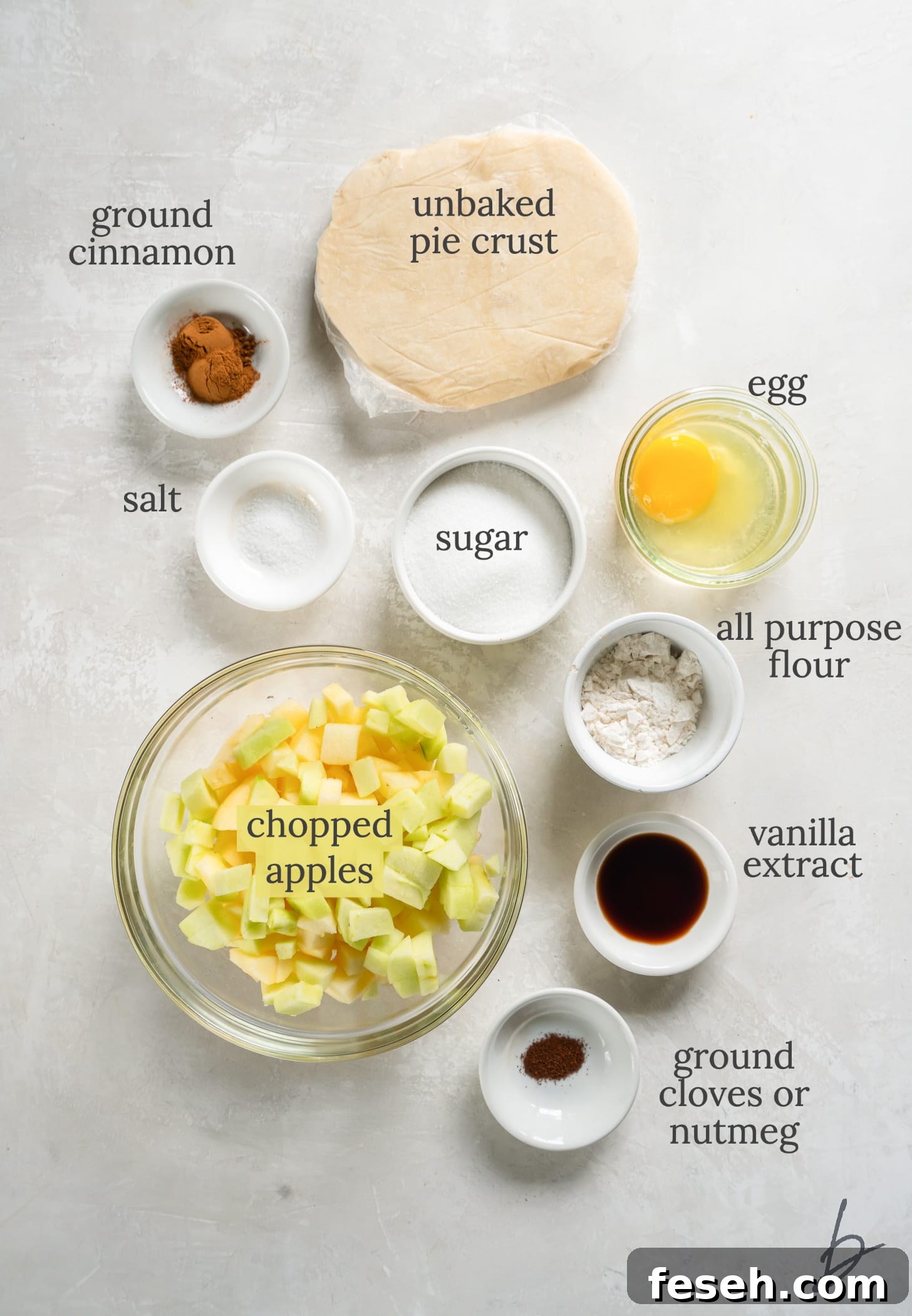 ingredients for mini apple pies in bowls labeled with text.