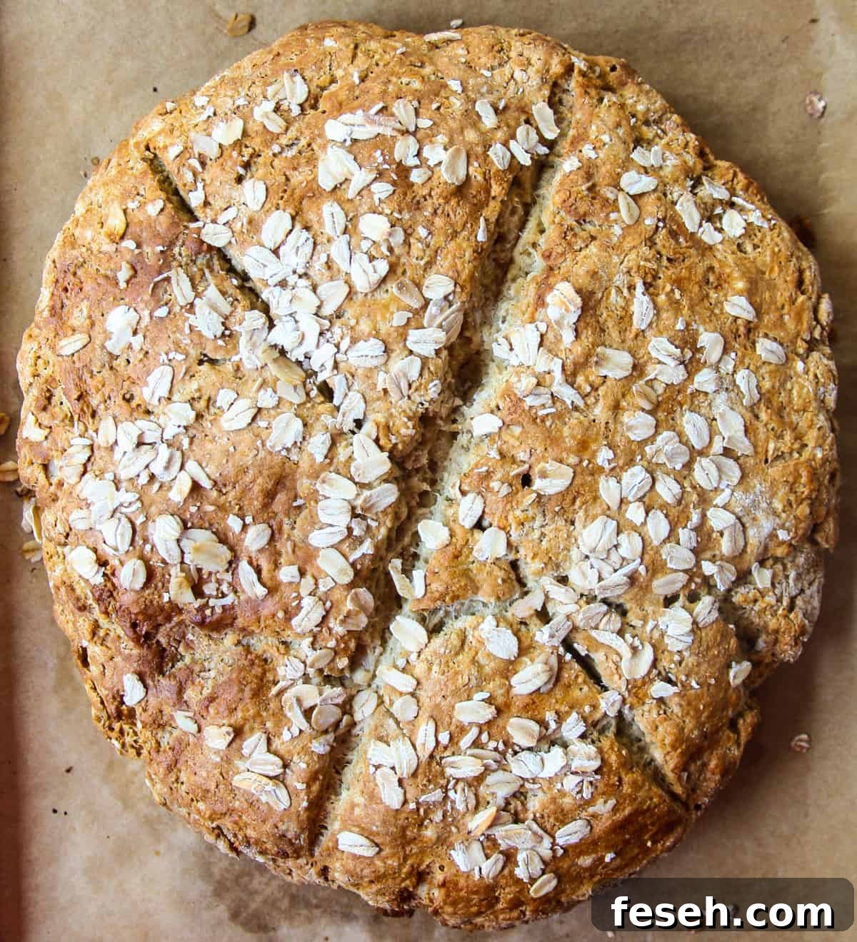 A freshly baked, crusty loaf of gluten-free Irish soda bread.