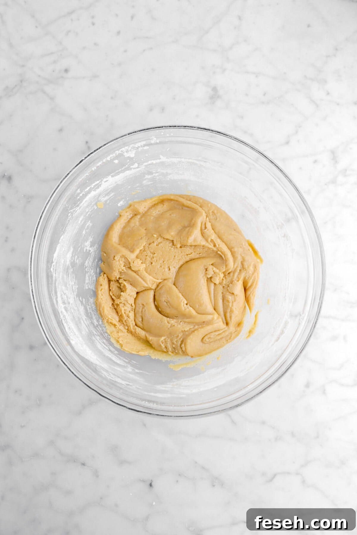 cookie dough in glass bowl.